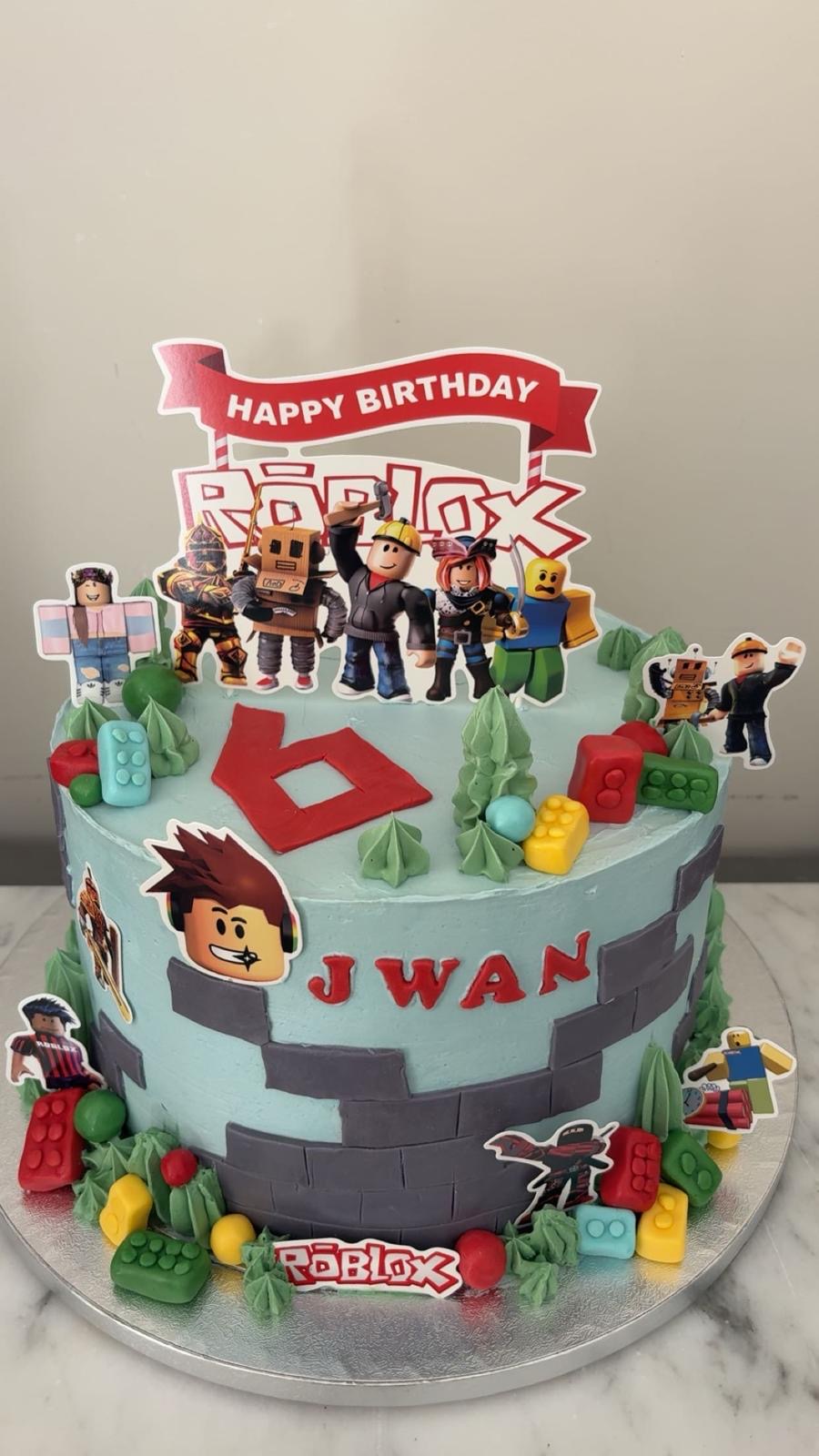 Roblox kids birthday cake with J WAN lettering